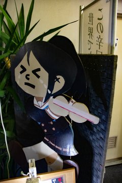 注意看板の前での会話